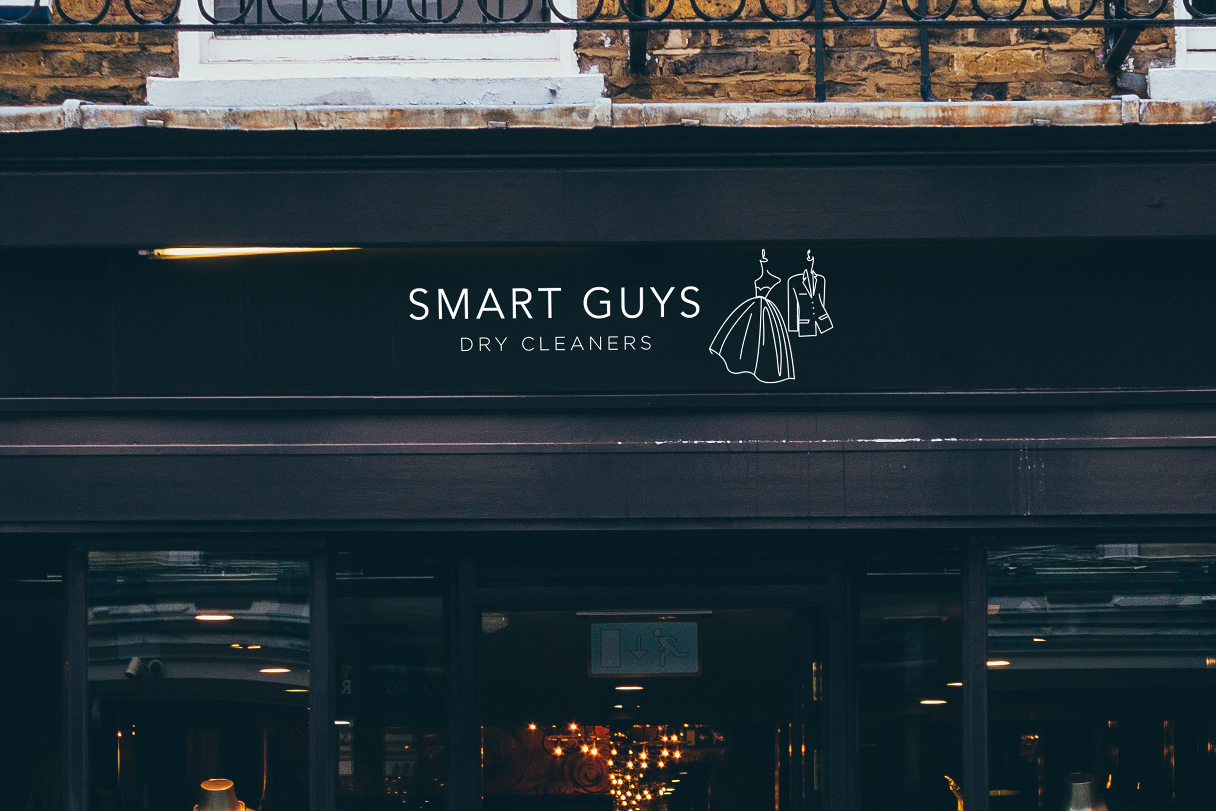 Smart Guys Dry Cleaner logo design mocked up on shop front